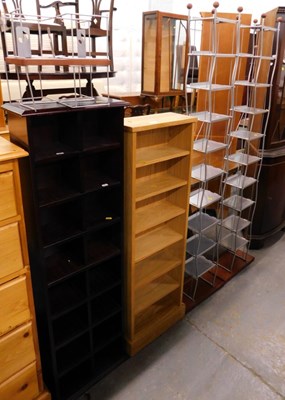 Lot 1522 - An oak seven shelf CD/book case, with pedestal...