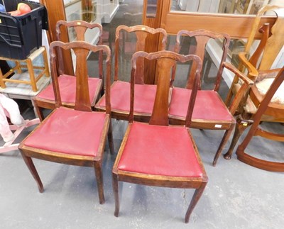 Lot 1518 - A set of five oak dining chairs, with red...