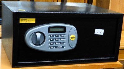 Lot 1530 - A Yale electronic home mini safe, 20cm high,...