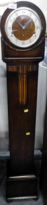 Lot 1545 - A mid-century oak cased grandmother clock,...