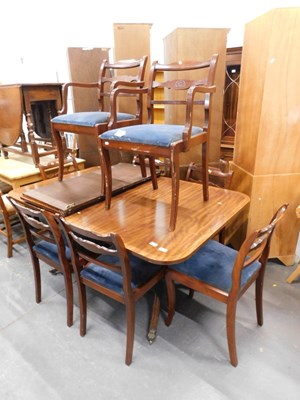 Lot 1519 - An extending mahogany dining table, with two...