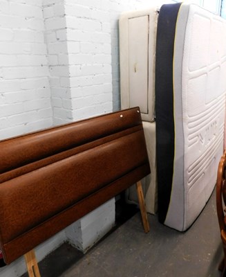 Lot 1560 - A double bed, on castors, a mattress, and a...