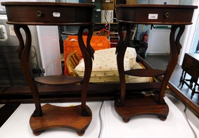Lot 1588 - A pair of unusual mahogany oval bedside...