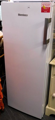 Lot 1590 - A Blomberg upright fridge freezer, with five...