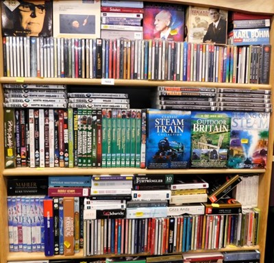 Lot 1633 - A large quantity of DVDs and CDs, DVDs to...