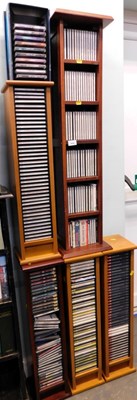 Lot 1636 - Five wooden CD cases, filled with a large...