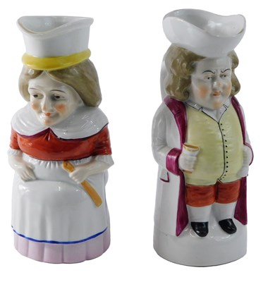 Lot 184 - Two Continental porcelain Toby jugs, modelled...