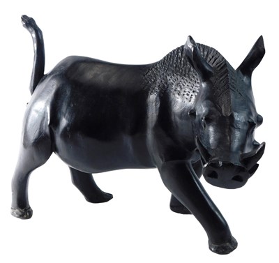 Lot 186 - An African ebonised and carved wooden model of...
