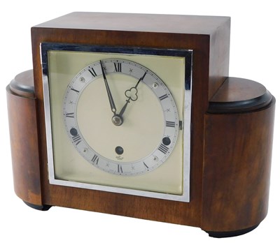 Lot 197 - An Elliott Art Deco mantel clock, in walnut...