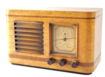 Lot 218 - A Pilot Little Maestro radio, in maple and...