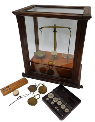Lot 233 - A brass and mahogany chemist's scales by S....