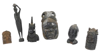 Lot 241 - A collection of African tribal carvings, to...