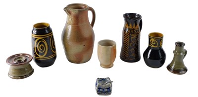 Lot 257 - A studio pottery slipware jug, signed Carole...