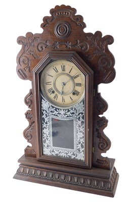 Lot 267 - An American gingerbread style mantel clock,...