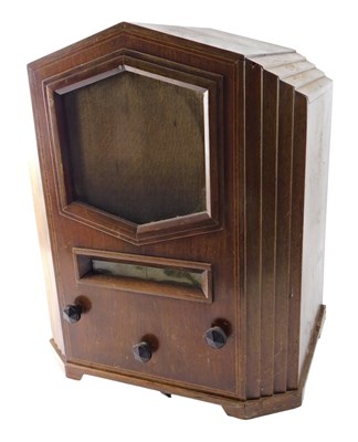 Lot 283 - A GEC Gecophone valve radio, in a walnut case,...