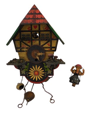 Lot 306 - A painted Black Forest cuckoo clock, decorated...