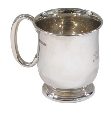 Lot 345 - A George V silver christening mug, of plain...