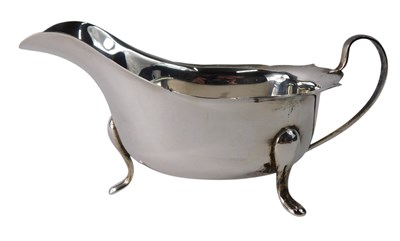 Lot 356 - A George IV silver sauce boat, with cabriole...