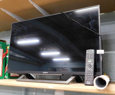 Lot 2004 - A Sony Bravia 32" television, with lead and...