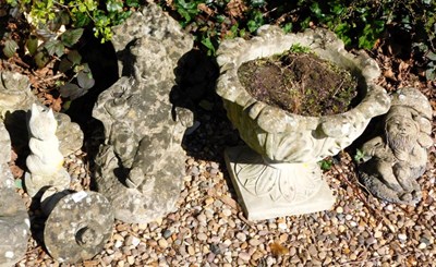 Lot 1661 - A group of concrete and other statues, to...