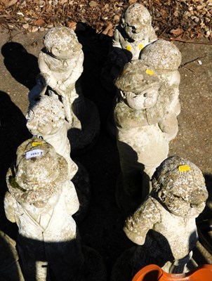 Lot 1667 - A group of garden ornaments, each modelled as...