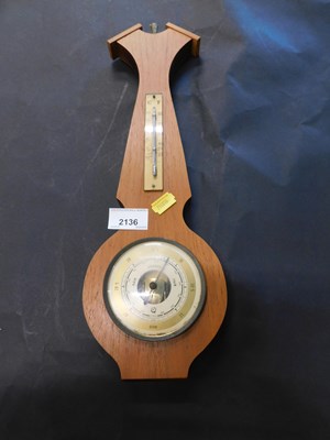 Lot 2136 - A teak banjo barometer, with mercury...