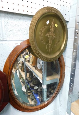 Lot 2199 - An oak framed oval wall mirror, with roundel...