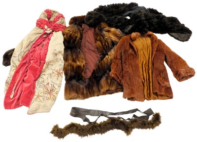 Lot 457 - Three fur coats, differing pelts, together...