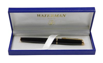 Lot 442 - A Waterman black and gold ballpoint pen, in...
