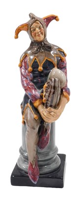Lot 483 - A Royal Doulton porcelain figurine, The Jester,...