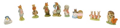 Lot 492 - A collection of Beatrix Potter figures, to...