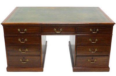 Lot 1147 - A George III mahogany partner's desk, the...