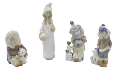 Lot 497 - A collection of four Lladro figurines, to...