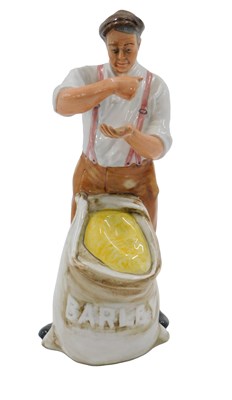 Lot 505 - A Royal Doulton porcelain figurine, The Farmer.