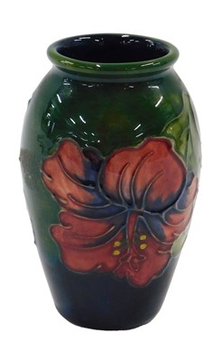 Lot 517 - A Moorcroft pottery small vase, decorated with...