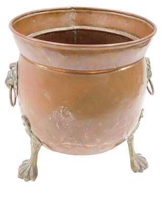 Lot 688 - A copper and brass coal bucket, with lion mask...