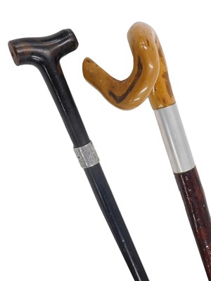 Lot 694 - A Victorian ebonised walking stick, with...