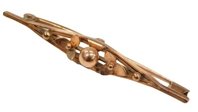 Lot 560 - A Lozenge shaped yellow metal bar brooch,...
