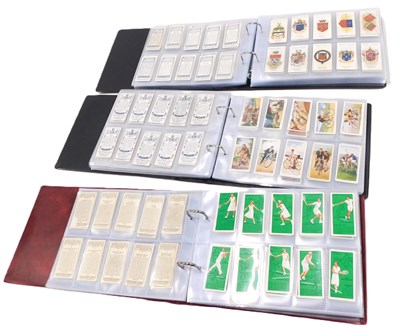 Lot 833 - Three albums of cigarette cards, to include...