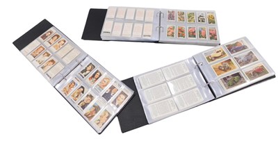 Lot 835 - Three albums of cigarette cards, to include...