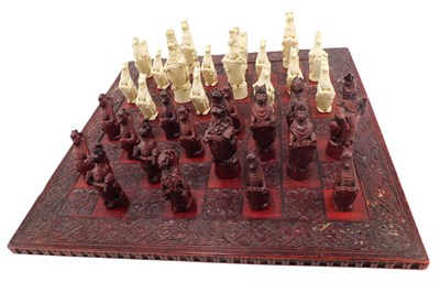 Lot 846 - A resin chess set, moulded in the form of...