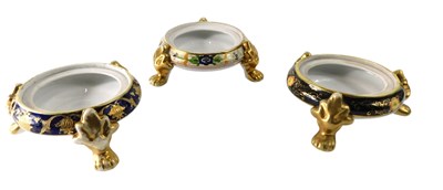 Lot 853 - Three Noritake porcelain urn stands, each on...