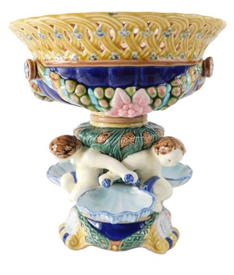 Lot 860 - A replica Majolica pottery centrepiece, with...