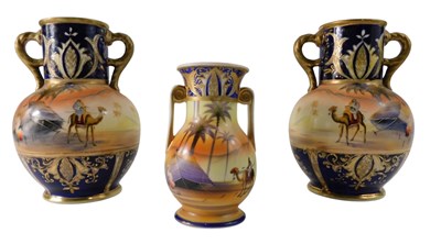 Lot 864 - A pair of Noritake porcelain vases, each...