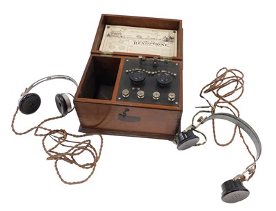Lot 895 - A Revophone crystal set, in a walnut case,...