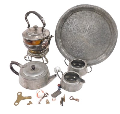Lot 900 - A silver plated spirit kettle and stand, with...