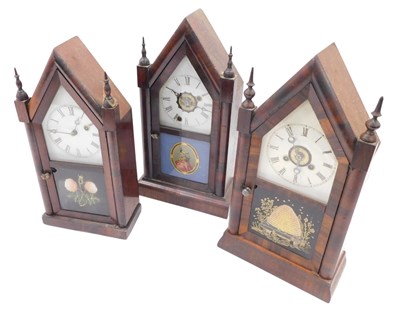 Lot 907 - Three American mantel clocks, each with a...