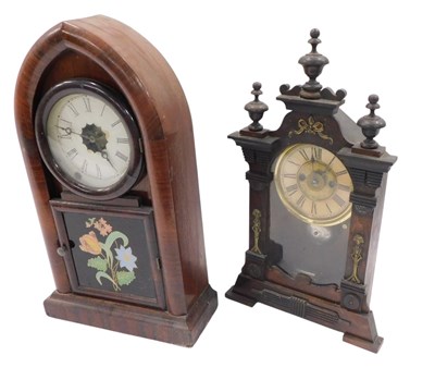 Lot 913 - An American walnut cased mantel clock, with...