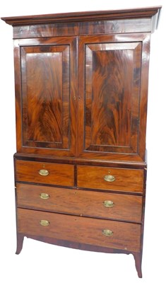 Lot 941 - A 19thC mahogany linen press, the top with a...