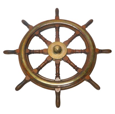 Lot 963 - A teak and brass ship's wheel, central boss...